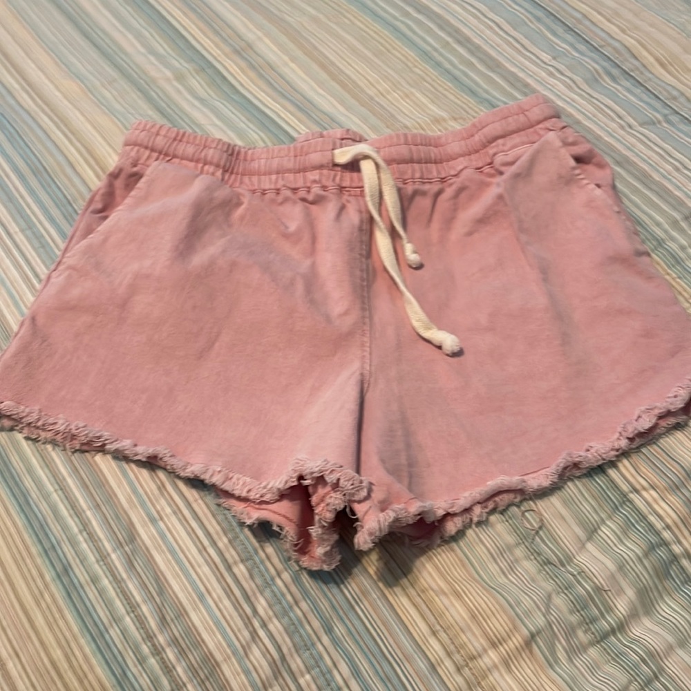 Pink denim pull on shorts.